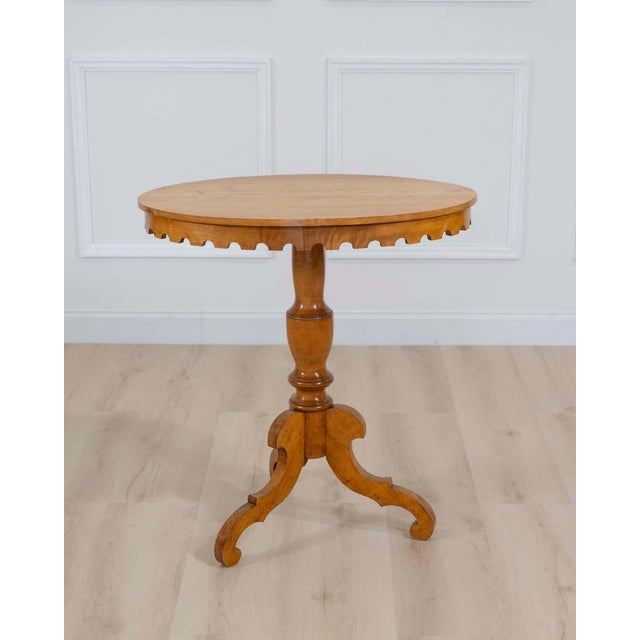 A charming late 19th-century Swedish oval side table crafted in beautifully figured flame birch, dating to circa 1890....