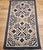 Discover the profound cultural richness and earthy beauty of this Vintage American Southwestern Area Rug, meticulously...
