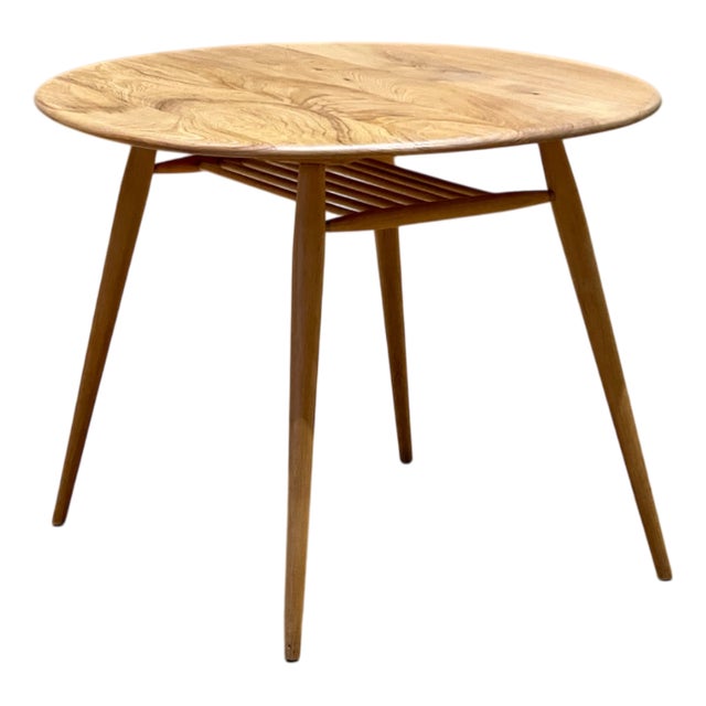 Vintage Round Dining Table with Rack by Lucian Ercolani for Ercol, 1960s For Sale