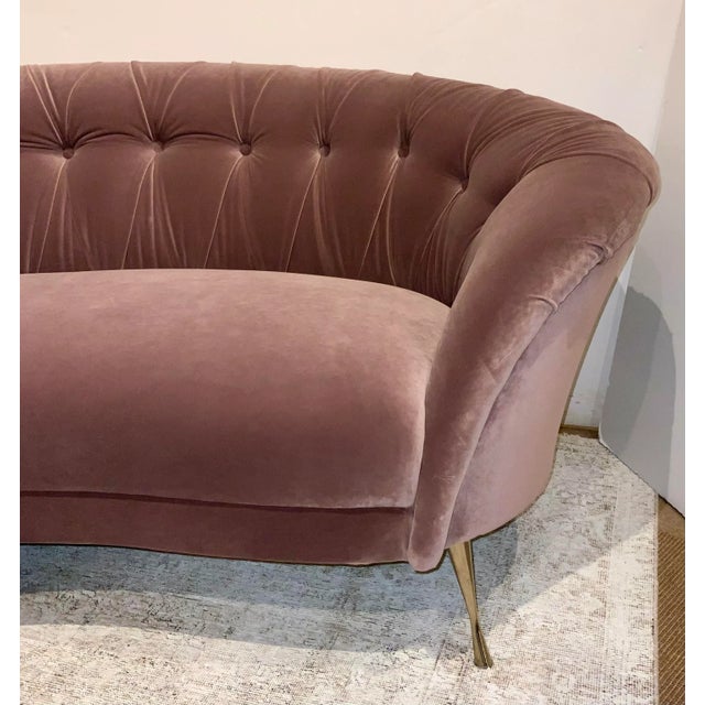 Stylish Caracole Modern Purple Velvet Sofa, tufting detail, brass finished tapered metal legs, showroom floor sample