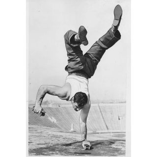 1940 Photograph of Man Balancing on Stadium Roof For Sale