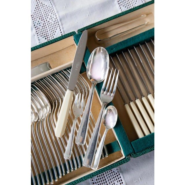 Large French cutlery set for 12 people made of silver-plated metal by Le Couvert Français, circa 1930–1950. The high-...