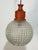 Spherical chandelier in thick glass, made in Italy, 1970 Orange metal frame. Glass intact, good condition (the frame shows...