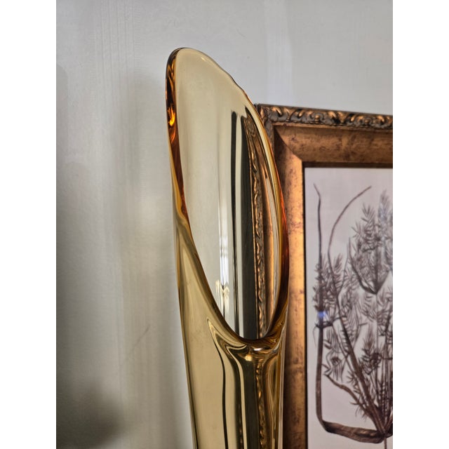 A striking example of mid-century American art glass, this monumental Viking "drape" vase captures the fluidity and drama...