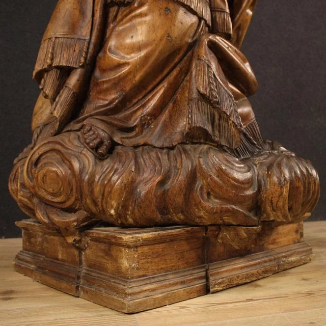 Great German sculpture from 18th century. Finely chiselled stone pine artwork depicting a subject of sacred art, a saint...