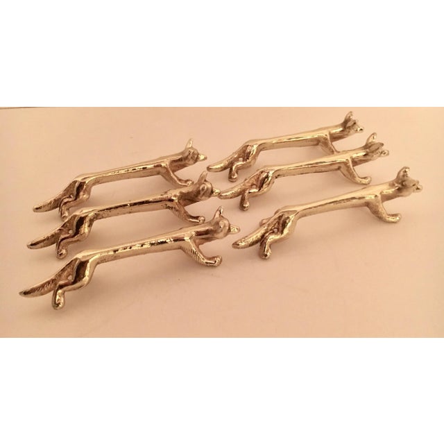 Set of six brass fox knife rests, freshly plated in shiny and tarnish resistant brass. For the most relaxed to elegant of...