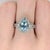 A rare santa maria aquamarine rests in a deep sea-blue at the centre of this solid 14K white gold ring, surrounded by...