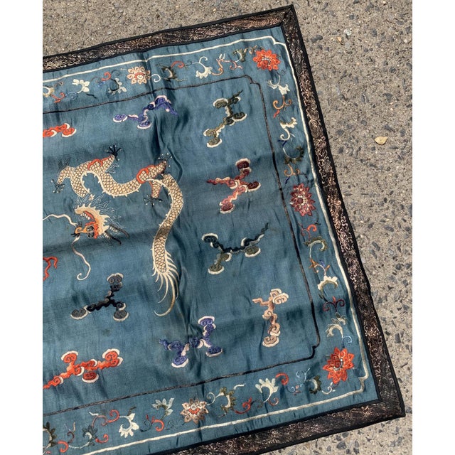 Handmade antique Chinese Dragon designed textile in silk. This tapestry is from the end of 19th century in original...