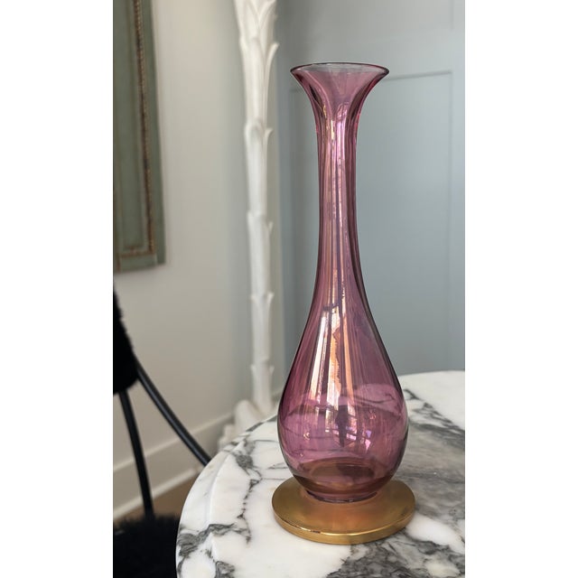 Elegant tall trumpet-form vase that is hand-blown in a rich cranberry-pink glass Rainbow Art Glass pieces were popular...