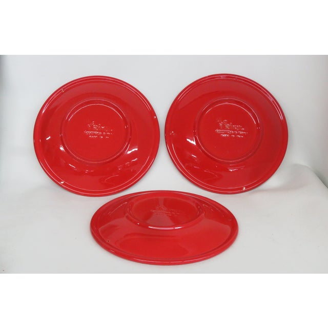 This beautiful set of 3 matching red ceramic plates by Primula Decorata was made in Italy. Featuring a vibrant shade of...