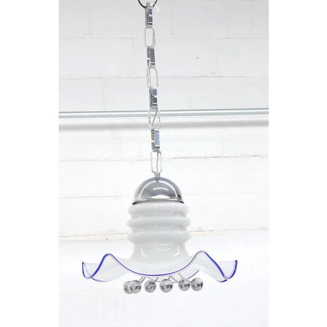 Midcentury Italian modern flower shape blown milk glass with cobalt trim and chrome pistils light fixture chandelier.