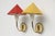 A pair of wall lamps from the mid-20th century with red and yellow fabric shades. Made in Germany in the 1950s. Metal...