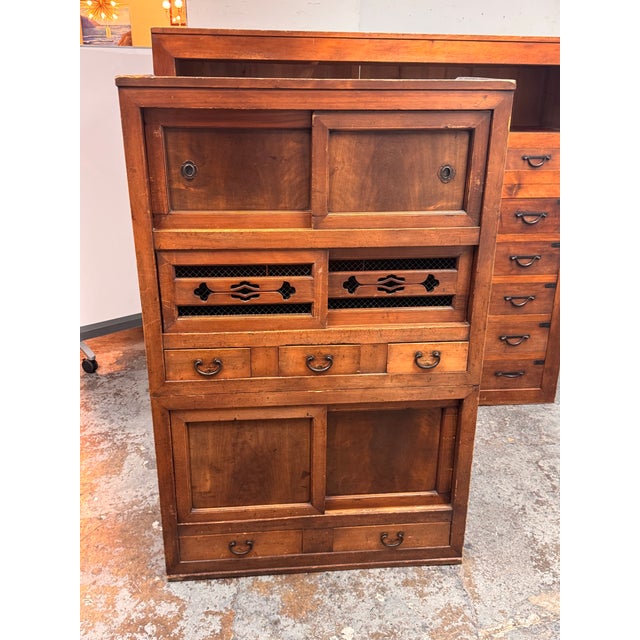 Design Plus Gallery presents a Mizuya Tansu Wood Storage Cabinet from Japanese Origin. The storage cabinet is made from a...