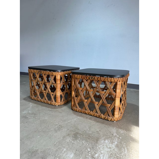 Pair of uncommon Tanganika model basket weave rattan side/end table pair designed by Danny Ho Fong for Tropi-Cal circa...