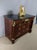 Empire commode early 19th century empire chest of drawers with detached mahogany columns from the first half of the 19th...