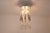 Murano glass chandelier with its flower-decorated tubes inserted into a circular chrome-plated metal frame. 1970s. This...