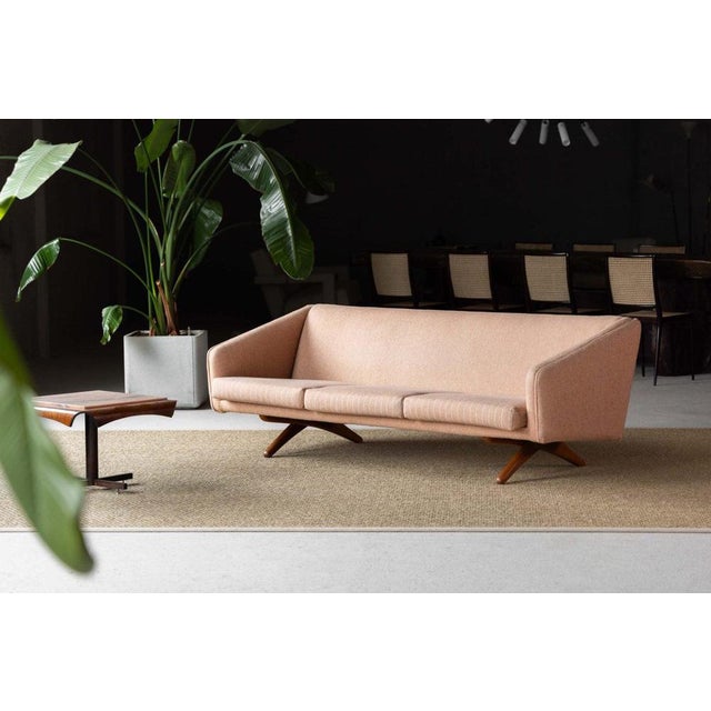 ML90 sofa designed by Illum Wikkelsø and manufactured by Mikael Lauersen in Denmark, 1956. This remarkable piece of Danish...