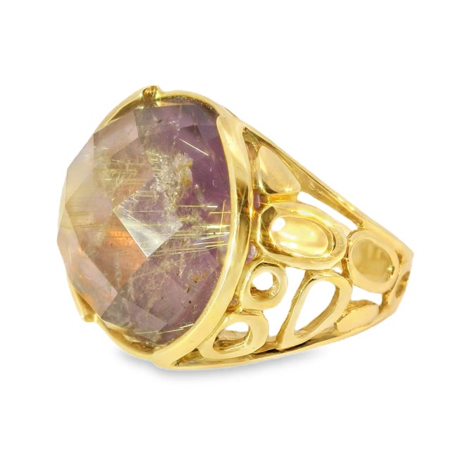 Add a touch of elegance to your collection with this 14K Yellow Gold Handmade Amethyst Ring. This exquisite piece...