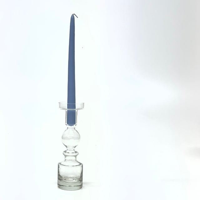 Transparent candle holder. A gorgeous, clear, groovy glass pompadour candlestick holder, perfect for livening up any...