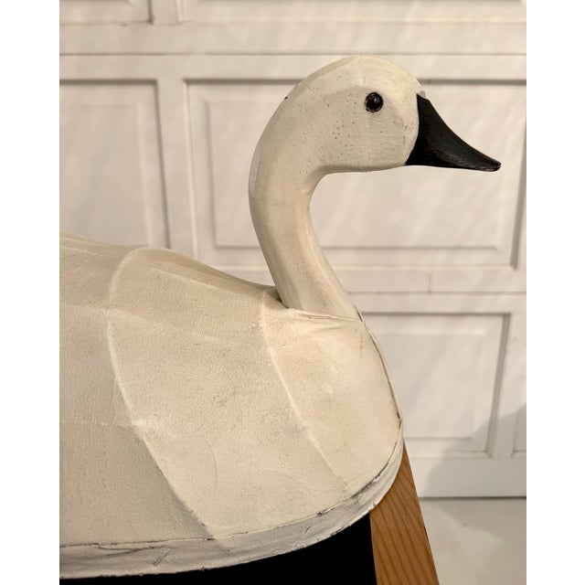 Here is a striking mid-century swan sculpture, crafted using a traditional canvas-over-wire armature technique that gives...