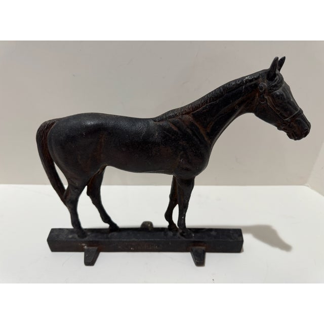 Vintage Virginia Metalcrafters Citation horse figure in dark finish with strong equestrian form and rectangular base....