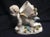 This is a beautiful large antique faint marked Sitzendorf cherub spill vase that measures 6 inches long by six and three-...