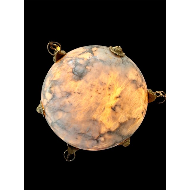 Art deco pendant light in black-veined white marble alabaster with full structure bronze fittings. Adorable alabaster...