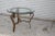 An elegant Vintage metal Round Coffee Table with a thick glass top. Understated in its simplicity the forging of this...