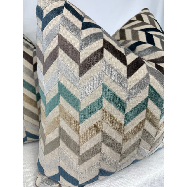 Custom pair of 22" pillows covered in a chevron stripe cut velvet. These pillows have tapered corners to prevent dog ears,...