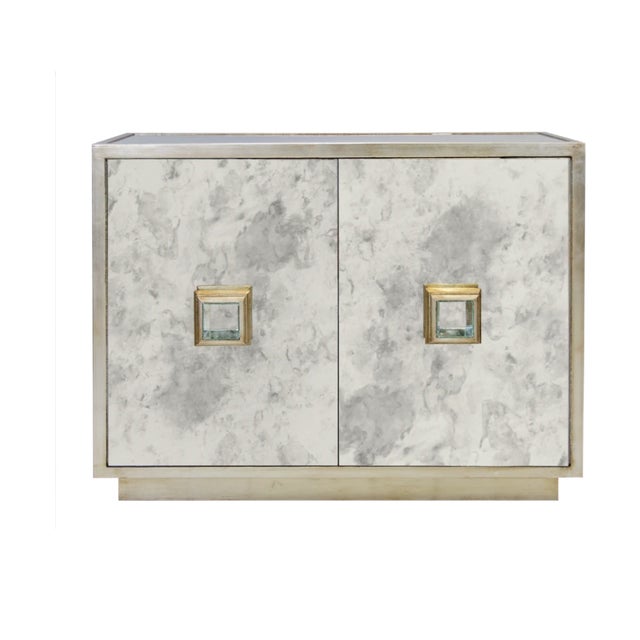 New special order item. Not vintage. The Worlds Away Winslow mirror cabinet delivers sleek modern style. Features a gold...