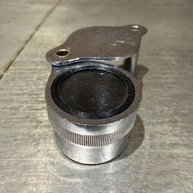 For your consideration, a 16x pocket magnifying loupe, likely a vintage or standard numismatic tool. These folding...