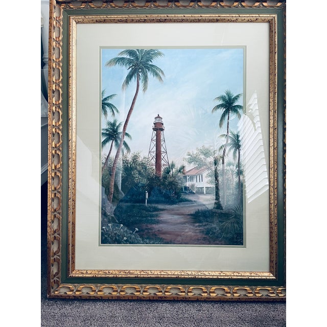 Beautiful print of Sanibel Island lighthouse with custom matte and frame. Excellent condition.