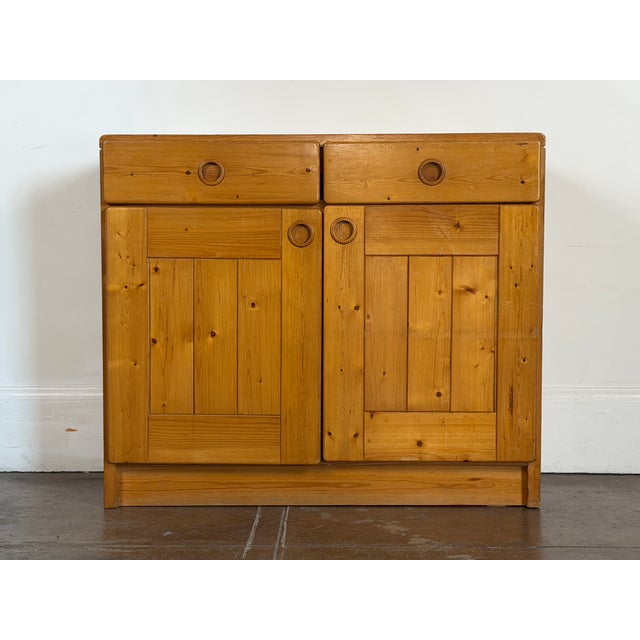 1970’s solid pine cabinet by Charlotte Perriand for Les Arcs. Good vintage condition. Patina all around consistent with...