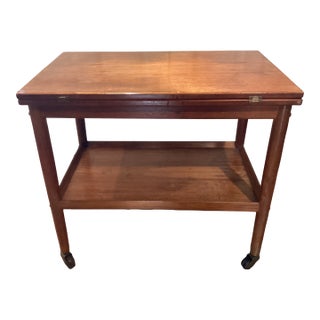1970s Midcentury Modern Teak Rolling Expandable Table With Shelf For Sale