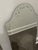A frameless, arch-top Pottery Barn mirror with beveled edges throughout. Over time, the mirror glass has developed a...