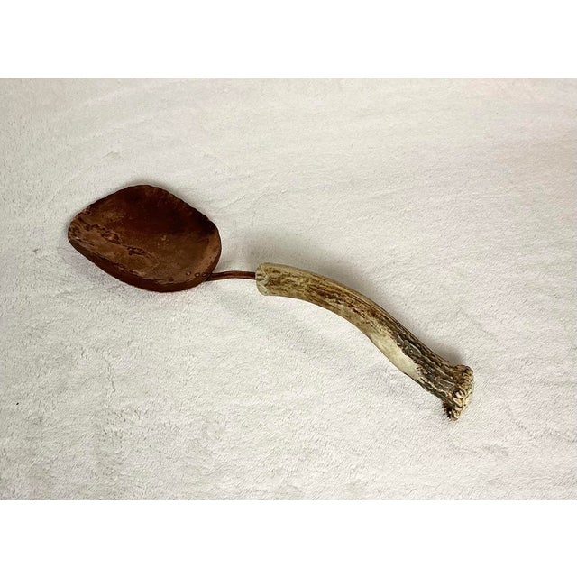 Crafted by Ben Caldwell of Ben & Lael is this substantial hand-hammered, hand crafted pure copper serving scoop/spoon with...