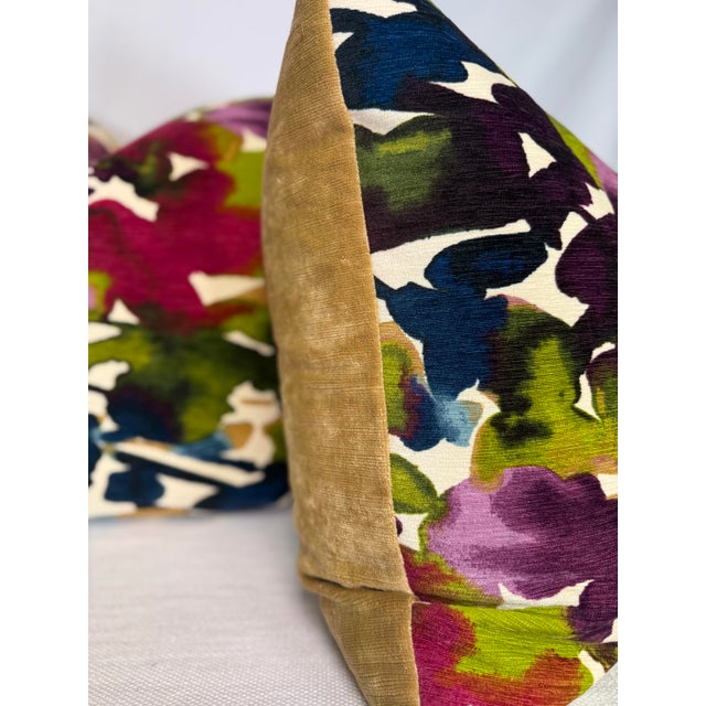Custom pair of 22" pillows covered in "Aquarelle" velvet in color orchid and backed in a coordinating golden beige linen...