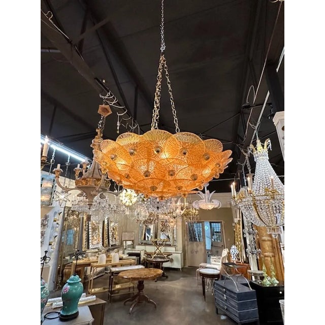 Modern Murano amber glass flush mount chandelier. Circa 200. The chandelier has been professionally rewired, comes with...