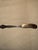 Elevate your tabletop service with this beautiful vintage hollow-handle master butter knife by the legendary American...