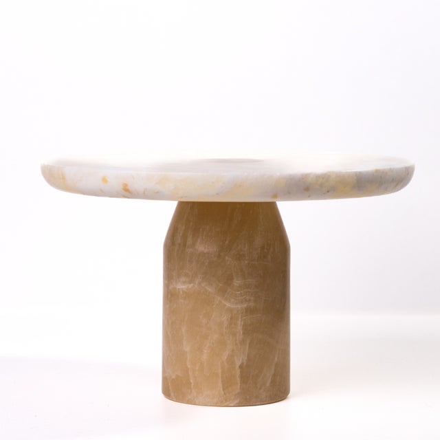 This marble cake stand from TOV brings timeless style to celebrations big and small. Featuring a yellow Onyx finish, the...