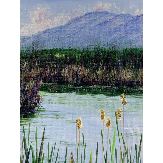 This gorgeous painting is titled "Our Refuge" and depicts a lovely marsh landscape scene with mountains in the background...