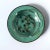 Rare Paul Haustein, WMF Ikora metal vide poche catchall with glass insert. The patinated green metal contrasts beautifully...