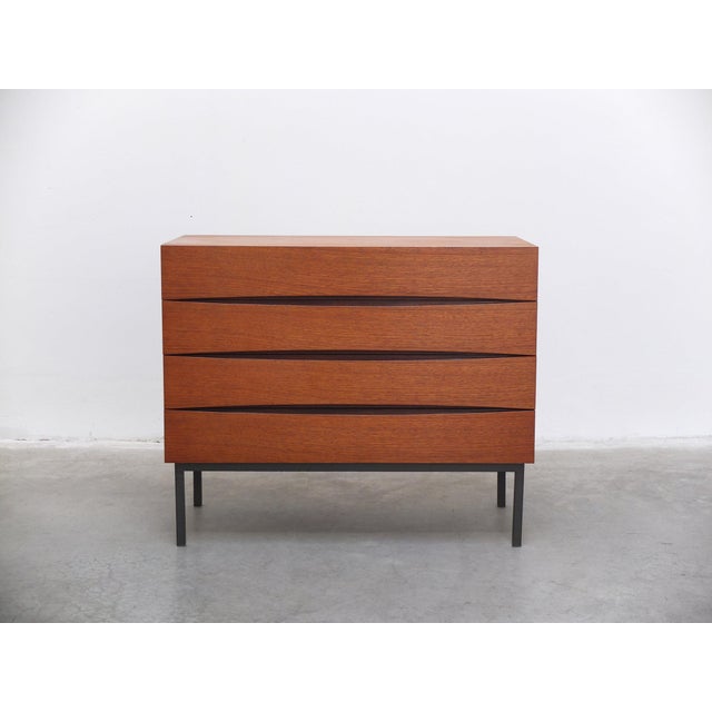 Interesting chest of drawers in teak wood produced in Denmark around 1960. It has beautiful curved drawers which look...