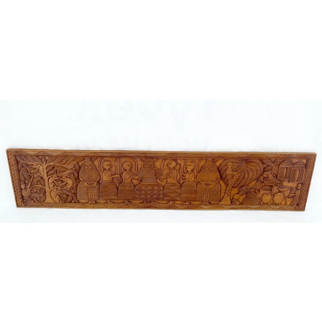 Large Carved Solid Teak Long Rectangle Wall Plaque Relief Sculpture Depicting Jangle Villagers.