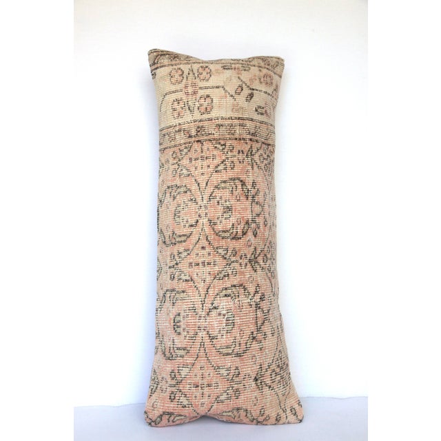 This vintage rug pillow cover offers a modern yet comfortable accent for contemporary interiors. Handcrafted from an...