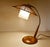 Vintage mid century desk lamp, featuring a sisal and glass shade mounted on a brass flex stem, teak base with star shaped...