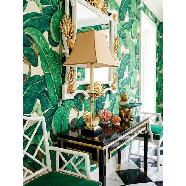 Bring a touch of coastal glamour and luminous luxury to your space with this stunning vintage solid brass shell...