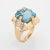 Stylish vintage estimated 11 carat aquamarine & diamond cocktail ring (circa 1960s) crafted in 14 karat yellow gold....