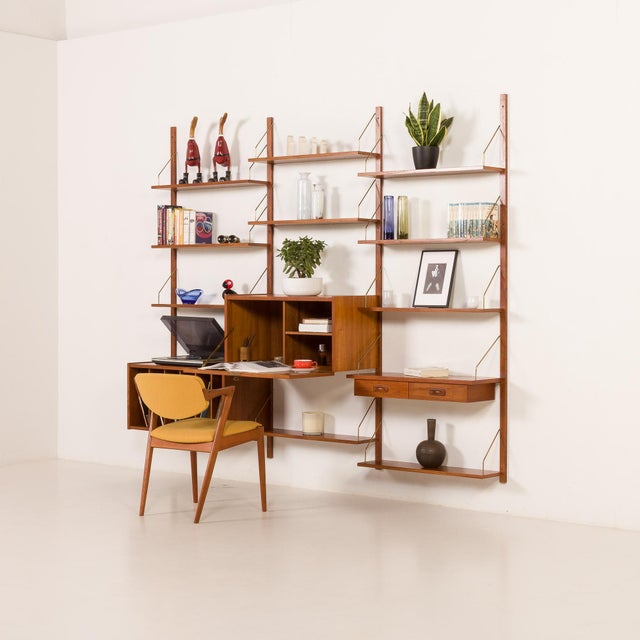 This elegant mid-century shelving unit with a vinyl records cabinet was designed by preben sorensen for ps system and...