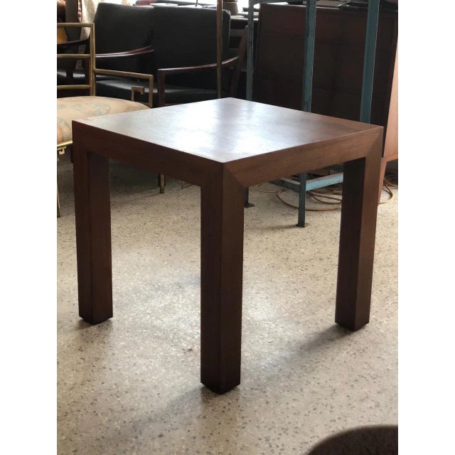 A signed Vladimir Kagan parsons square shaped table. Nicely figured walnut, measuring approx.